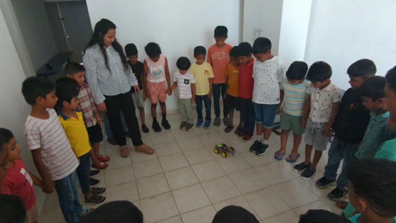 Students lined up with their robots in Mount Lavinia